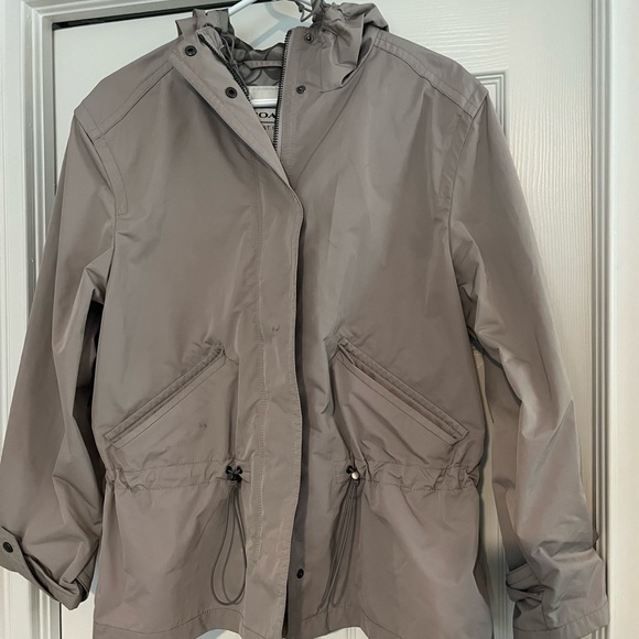 Barely worn Coach rain jacket with signature logo, hood, pockets &cinched waste - Picture 2 of 8